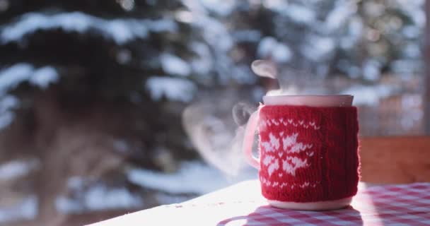 Cup of hot drink in the winter — Stock Video