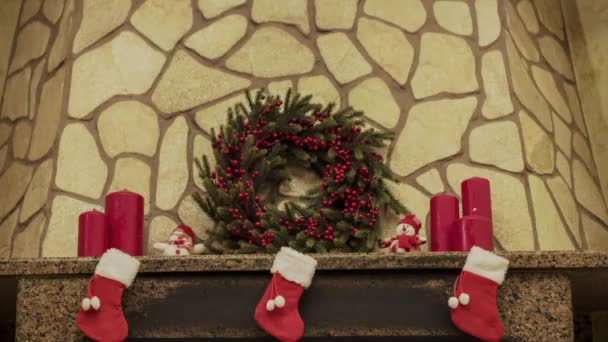 Warm cozy fireplace decorated for Christmas — Stock Video