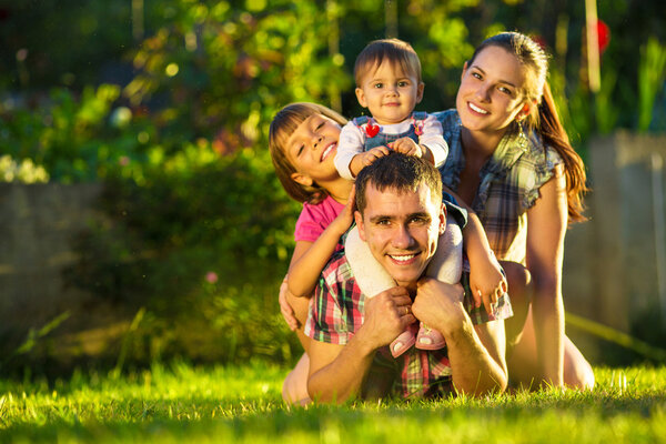 Family having fun outdoors in summer.