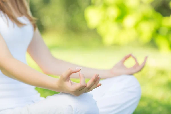 Woman meditating in lotus position. — Stock Photo, Image
