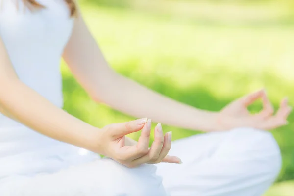 Woman meditating in lotus position. — Stock Photo, Image