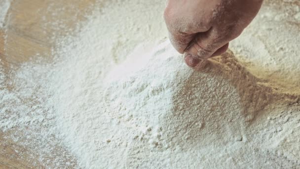 Hand preparing flour — Stock Video