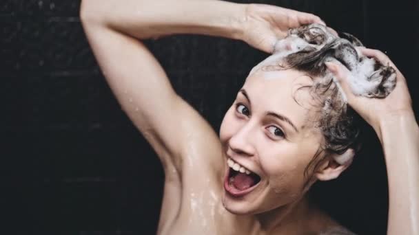 Woman washing her hair — Stock Video