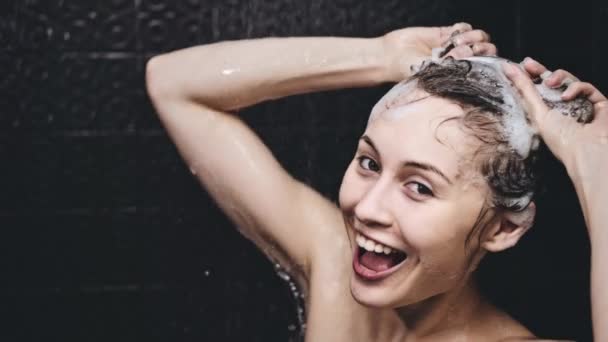 Woman washing her hair — Stock Video