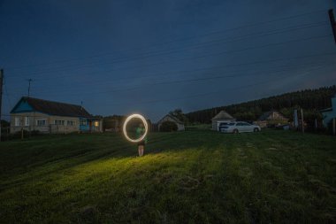 light painting with a flashlight at dusk. High quality photo