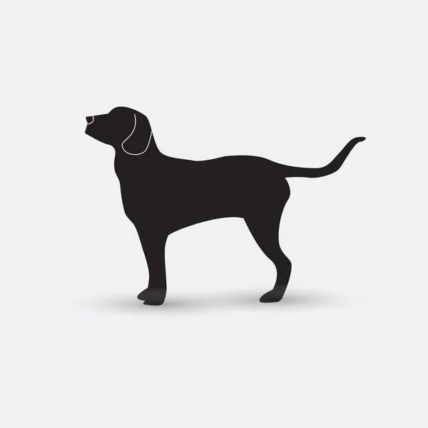 Silueta vectorial de un perro sobre fondo blanco . — Vector de stock