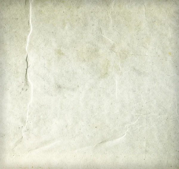 Folha de papel bege sujo enrugada velha — Fotografia de Stock