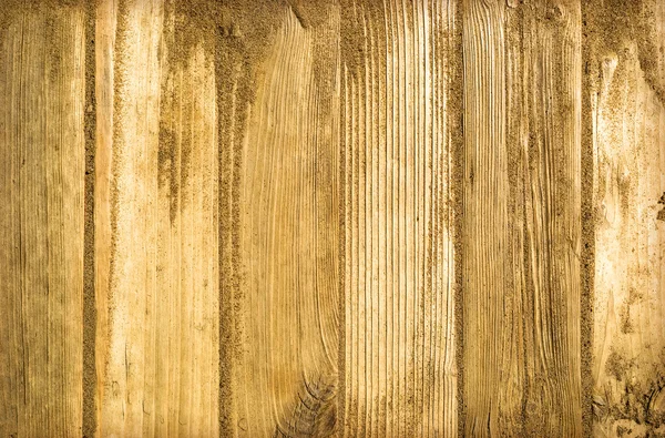 Sand auf geplanktem Holz Hintergrund - Nahaufnahme. — Stockfoto