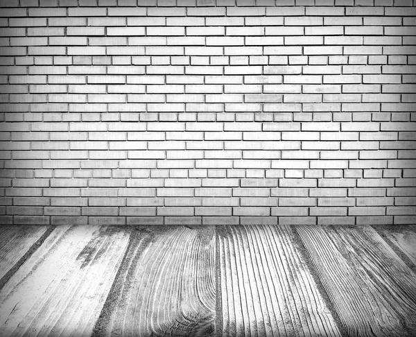 Interior de la habitación vacía: pared de ladrillo y suelo de madera —  Fotos de Stock