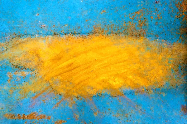 Peeling blauw oranje verf op een metalen oppervlak — Stockfoto