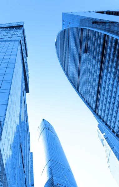 Perspective wide angle view to blue glass building skyscrapers — Stock Photo, Image