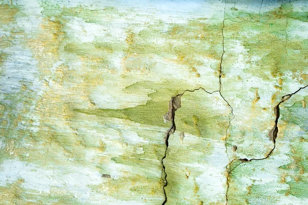 Grön målade väggen, skadad yta — Stockfoto