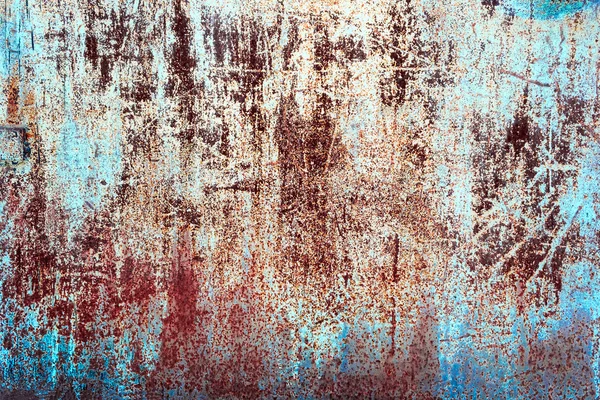 Rusty colored metal with cracked paint — Stock Photo, Image