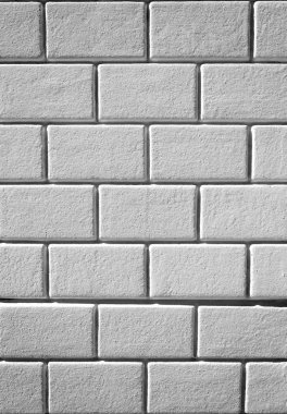 Dikey görüntü beyaz dokulu tuğla duvar. Portre