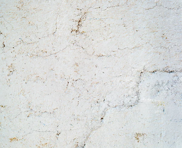 Hormigón agrietado pintado pared fondo — Foto de Stock