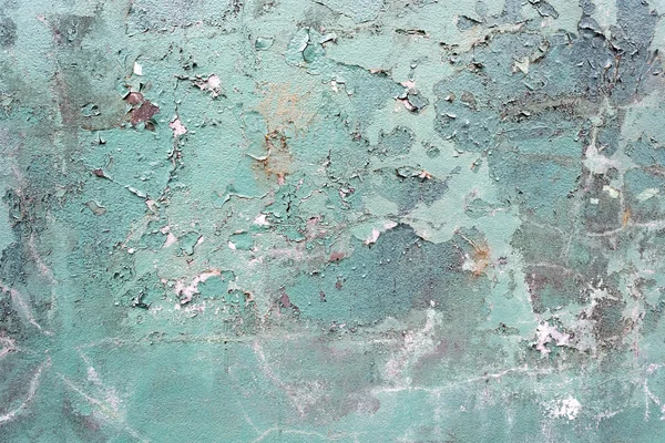 Grön betong knäckt målad vägg, skadad yta — Stockfoto