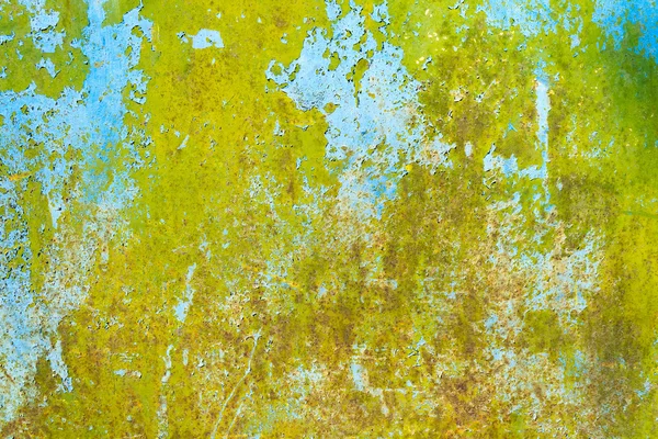 Rusty painted green metal texture with cracked paint.