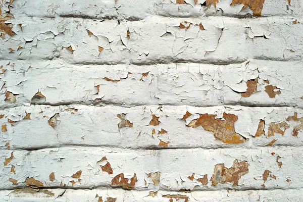 Blanco pintado fondo de pared de ladrillo agrietado —  Fotos de Stock