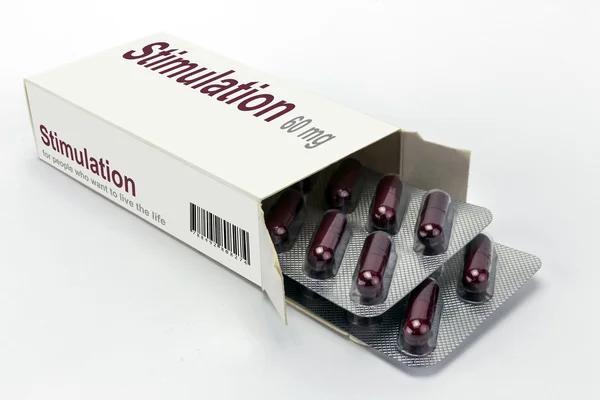 Open medicine packet labelled stimulation opened at one end to d — Stock Photo, Image