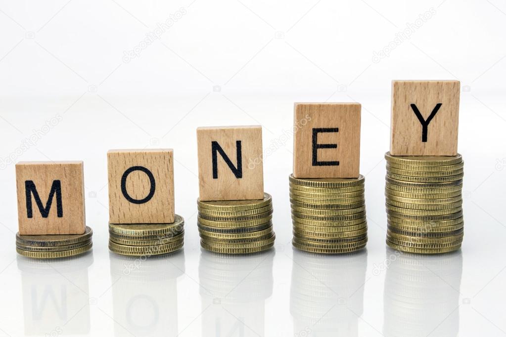 Coin stacks with letter dice - Money