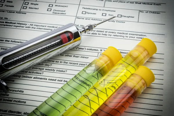 Test medicine vials and syringe — Stock Photo, Image