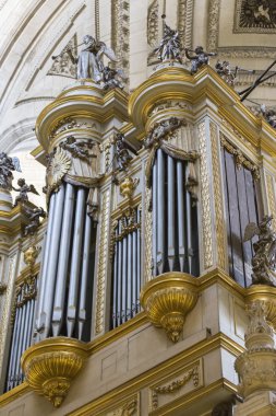 View of the monumental organ located within the choir, typically Spanish, baroque style with horizontal tubes in both facades, Spain