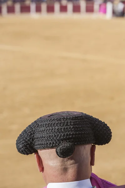 Detail of Pigtail, in the XIX century the bullfighters were left to grow a ponytail that braided in a bun called mona, vague recollection of the times of the wigs of the XVIII century, in the Bullring of Ubeda, Spain — Stock Photo, Image