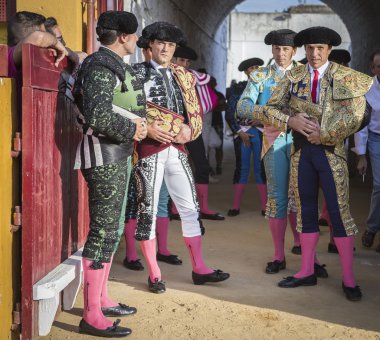 Spanish bullfighters at the paseillo or initial parade in Andujar, Jaen province, Spain clipart