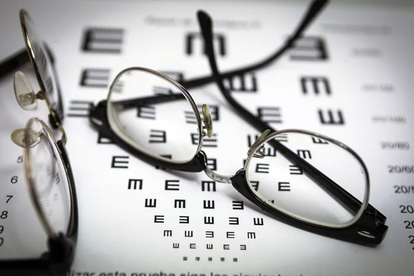 Glasses and tables to check the terms of — Stock Photo, Image