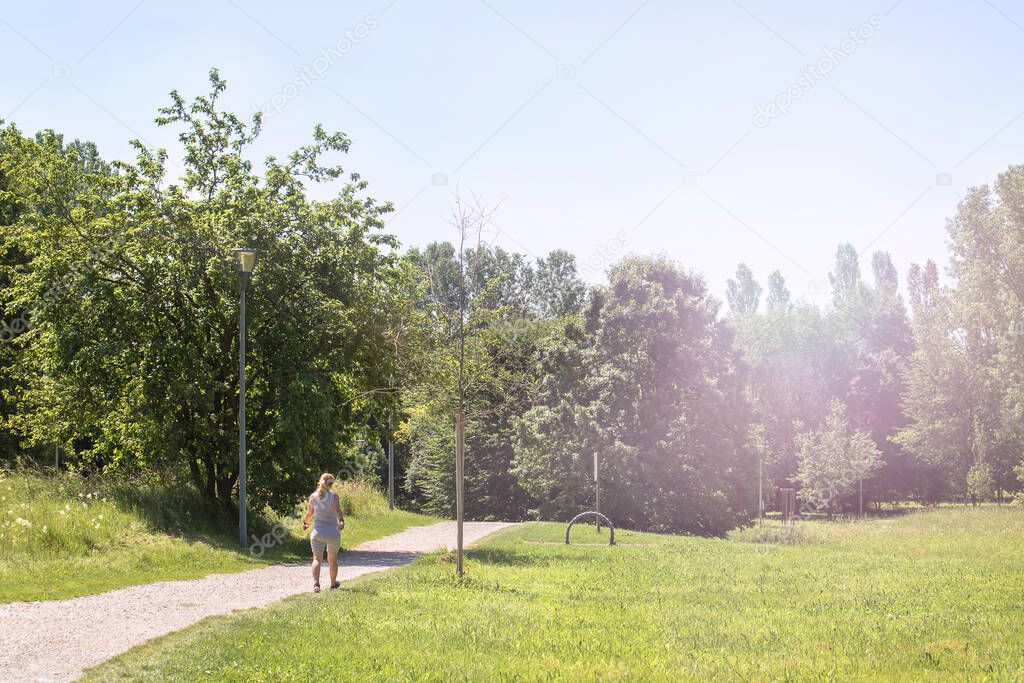 lady walking quietly, soft sport in the nature