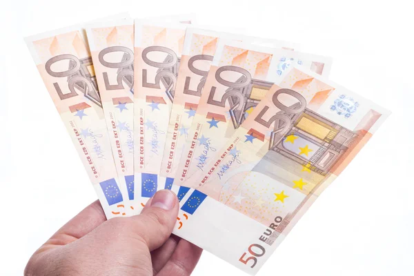 Hand giving fifty euro fan — Stock Photo, Image