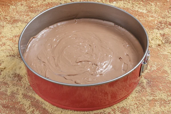 Att göra choklad cheesecake — Stockfoto