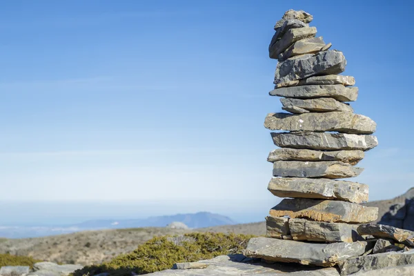 Pilha de pedra na montanha — Fotografia de Stock