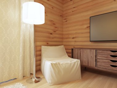 Wood TV console with a comfortable white armchair and a floor.