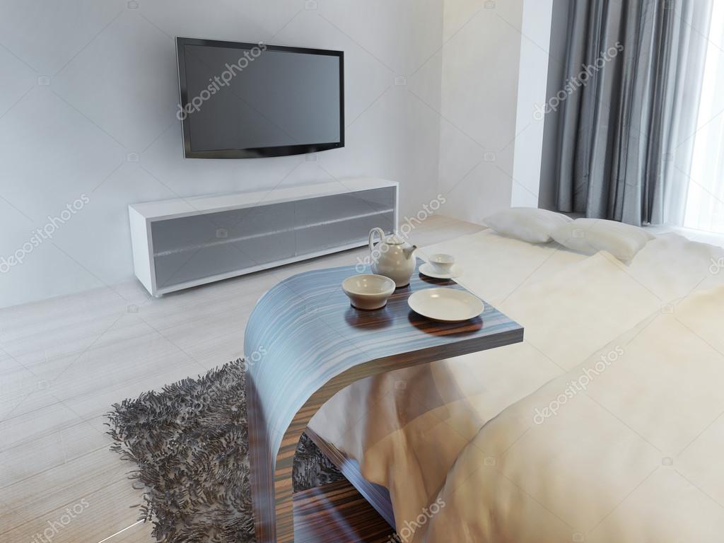 Side Coffee Table Beside The Bed In Contemporary Style