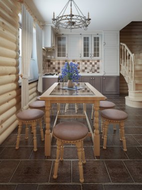 İç pencerenin yanında yemek masası ve sandalyeler.