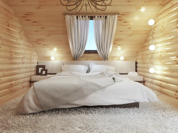 Schlafzimmereinrichtung in einem Holzscheit im Dachgeschoss mit Dachfenster. — Stockfoto