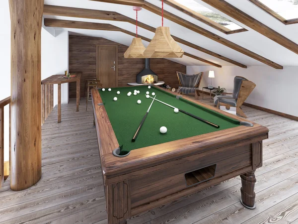 Billiard room in the attic with sitting area and fireplace. — Stock Fotó