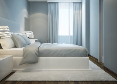 Mavi yatak odasında karlı beyaz yatak