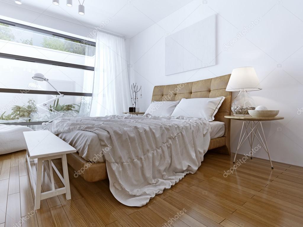 Modern bedroom with floor to ceiling windows