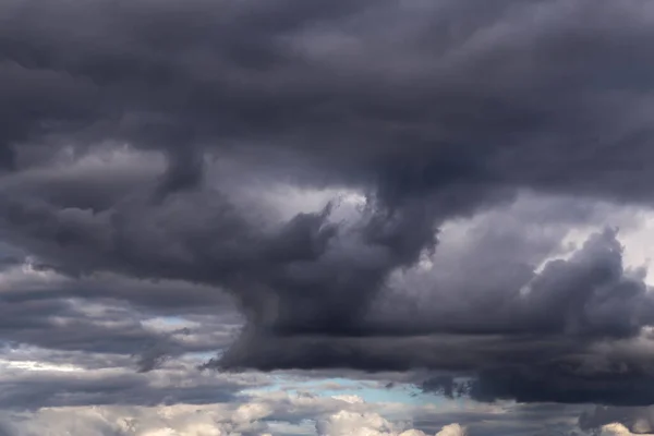 Epic Dramatic Storm sky, dark grey violet thunderstorm clouds background texture, tornado