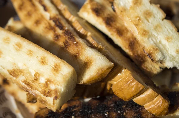 Bread on a brazier — Stock Photo, Image