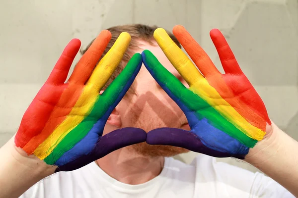 Mãos arco-íris LGBT — Fotografia de Stock