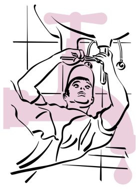 Tesisatçı çalışıyor.