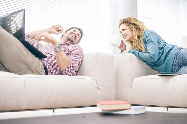 Couple on sofa in the living room — Stock Photo, Image