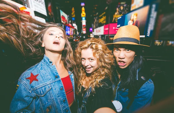 Friends making party in Time square — Stock Photo, Image