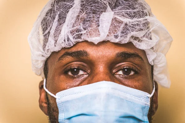 Doctor wearing protection suit and face mask for fighting Covid-19 ( Corona virus ) - Nurse portrait during coronavirus pandemic quarantine, concepts about healthcare and medical