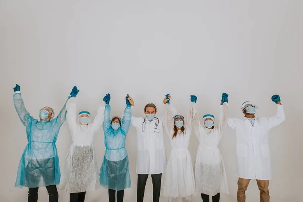 Tým Lékařů Sester Jednorázových Ochranných Oblecích Obličejových Maskách Pro Boj — Stock fotografie