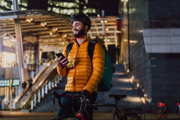 Food delivery service, rider delivering food to clints with bicycle - Concepts about transportation, food delivery and technology