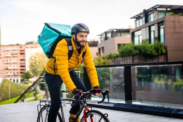 Food delivery service, rider delivering food to clints with bicycle - Concepts about transportation, food delivery and technology